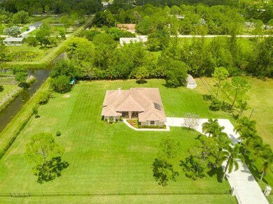14713 86th Rd N-small-005-11-Yard-666x44