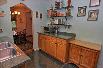 Well maintained, updated kitchen offers load of po