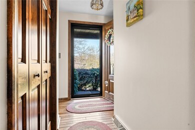 Beautiful hardwood floors greet you at the front d