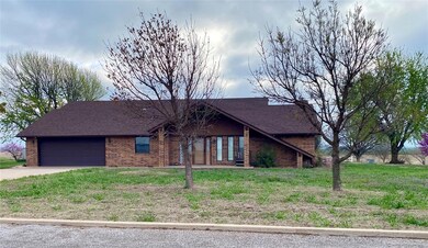 View of front of property featuring a front yard a