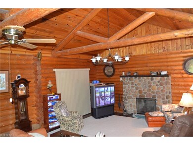 Great room, with sliders to sunroom