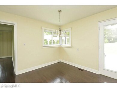 Dining Room. Light floods this space.  You will be surprised how much space this is for casual dining or formal.  Corner window offers a ledge for plants.