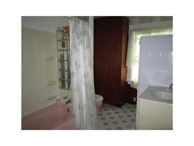 Bathroom. Main Floor Laundry in Bathroom