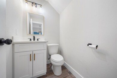 Half bath. Photos of a different duplex with same