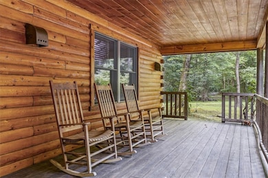 The covered, front porch spans the whole lentgh of