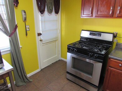 Gas range and rear entrance