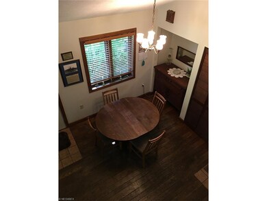 View of the dining area from the open loft area at