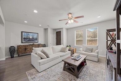 Living area featuring recessed lighting, wood fin