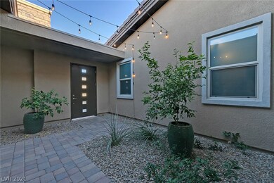 Courtyard walkway from front door to driveway