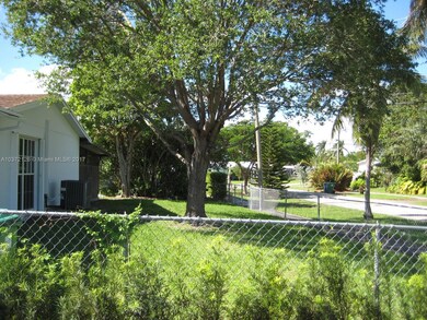 Beautiful side yard corner lot with mature oak tree.