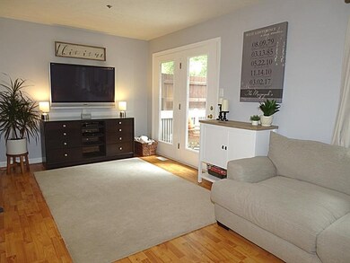 Double panel atrium style door opens to the deck & back yard...