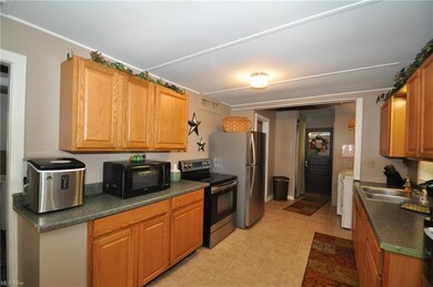View of kitchen with ceramic flooring