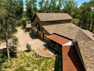 Front exterior aerial from main residence side