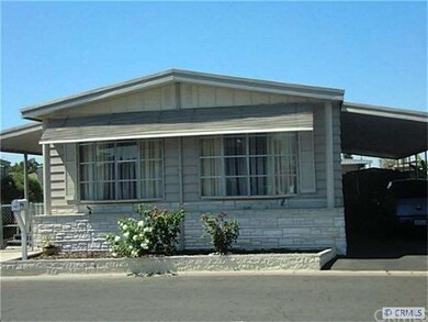 Carport on the Right and Front Door/Private Yard o