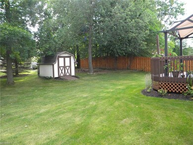 Garden shed and mature trees in this private back 
