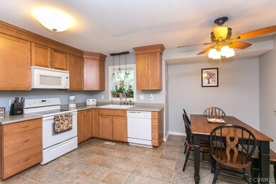 Eat in kitchen has beautiful cabinetry