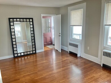 Unit 1: Side entrance and double living room