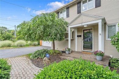 Approaching the front door, we see the appealing l