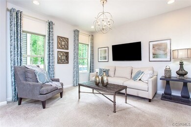 Family room looks out onto the back patio.