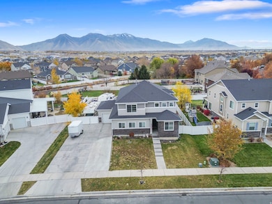 Aerial perspective of suburban area featuring a mountain backdrop