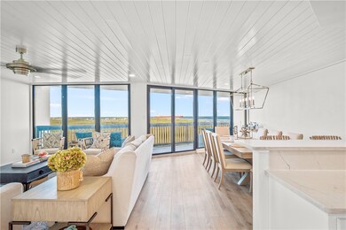 The living and dining room has access to a large b