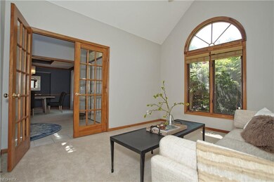 French doors from the entryway lead to this study 