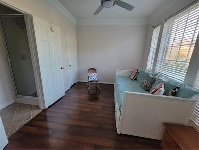 A View of the 1st floor Secondary Bedroom with the door opened to the En-Suite Bath that can also be used as an office