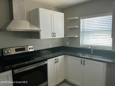 4127 Pinewood Dr NE unit 6, Palm Bay, FL 32905 - photo 2