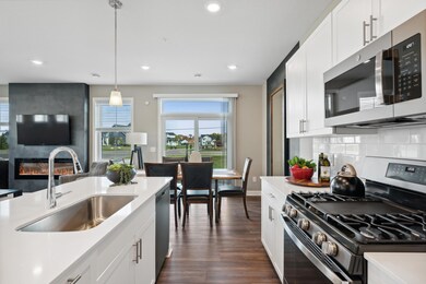 The main level is spacious and covered in natural light! *Photos of model home; colors and finishes will vary.