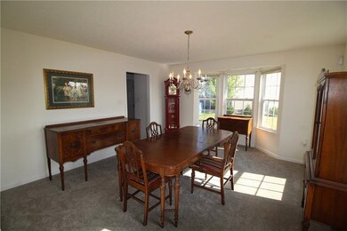 Dining room has been recently painted and has new 