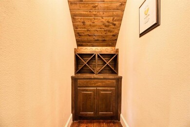 This custom home comes with a dedicated wine storage area, just in time for the holidays!