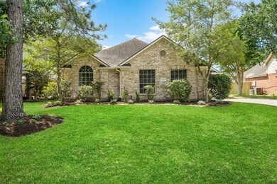 This home has beautiful curb appeal with aged trees and greenery.