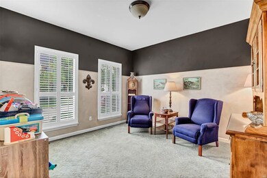 Off the foyer is a sitting/flex room. What would y