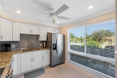 Expansive floor to ceiling windows fills the kitch