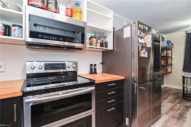 REFRIGERATOR WILL BE REPLACED WITH NEW STAINLESS STEEL REFRIGERATOR