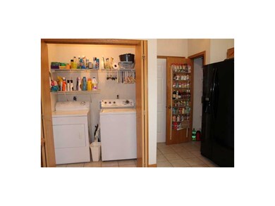 Pantry. Laundry room and pantry conveniently locat