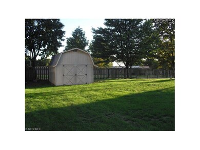 Large yard with storage shed