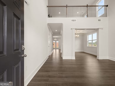 Grayson front entryway with hardwood-like flooring