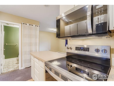 Newer appliances and beautiful new bathroom tile flooring