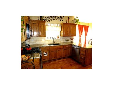 Another view of kitchen showing stainless dishwash