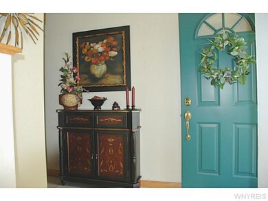 Foyer. GRACIOUS CERAMIC TILED FOYER - LEADS TO FAM