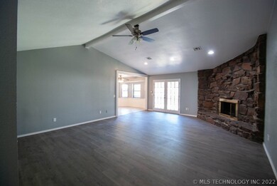 Looking into living room from entry way. Cathedral