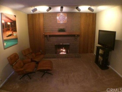 Family room with a fireplace located just off the 
