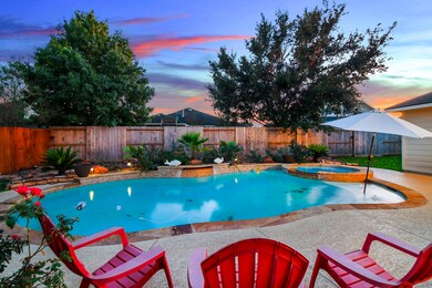 This Home offers a heated pool and spa both great for entertaining in the colder months. - look no further!  
Check out the water fall.