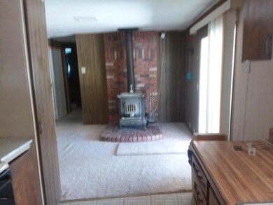 Moon vista wood stove from kitchen