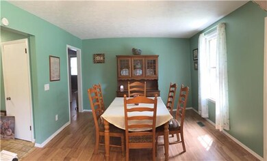 Dining area offers plenty of space and light from the front window