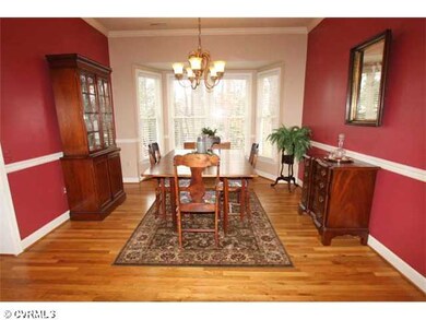 Dining Room - Formal dining room with wood floor, 