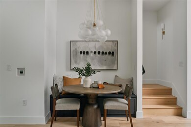 Dining area featuring a chandelier, breakfast are