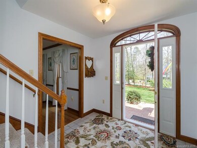 Large foyer and arched entry doorway