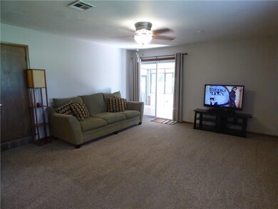 Sliding Glass Door leads to Sunroom